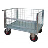 Pianale a 4 sponde di cui 1 ribaltabile in rete con ruote pneumatiche,