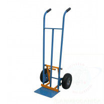 Hand truck with a pushout noseplate and puncture-proof wheels